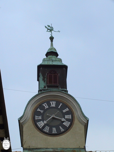 Idrija castle clock tower and Mercury weathervane.JPG